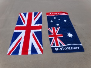Australian and UK towels on the beach